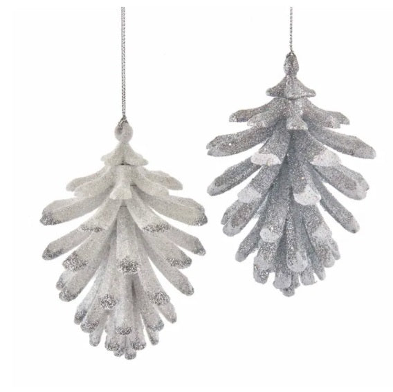 Ornaments shaped like pine cones covered in glitter. One is white with silver tips and the other is silver with white tips.