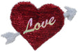 Tinsel decoration for Valentine's Day. Red tinsel heart with a white arrow though it. In the middle, it reads "LOVE" in a cursive, holographic font.