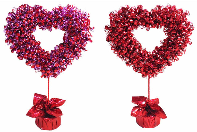Tinsel tabletop decorations shaped like tinsel hearts. This image shows you the two different color options.