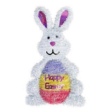 A 3D tinsel Easter bunny holding a multi-colored egg that reads "Happy Easter"