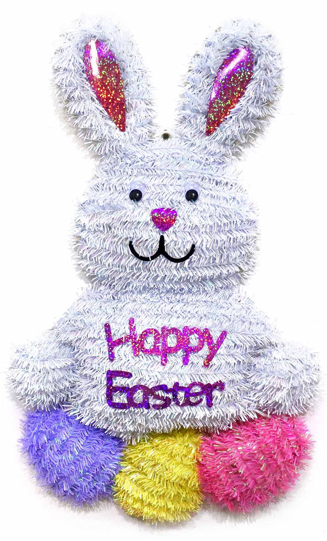 A tinsel bunny hanging decoration that reads "HAPPY EASTER" and is holding a purple egg, a yellow egg and a pink egg