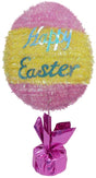 A tinsel tabletop decoration for Easter. It's pink and yellow. The text is a shiny blue color and it reads "Happy Easter"