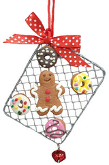 Ornaments designed to look like cookies in silver cut outs or on trays.