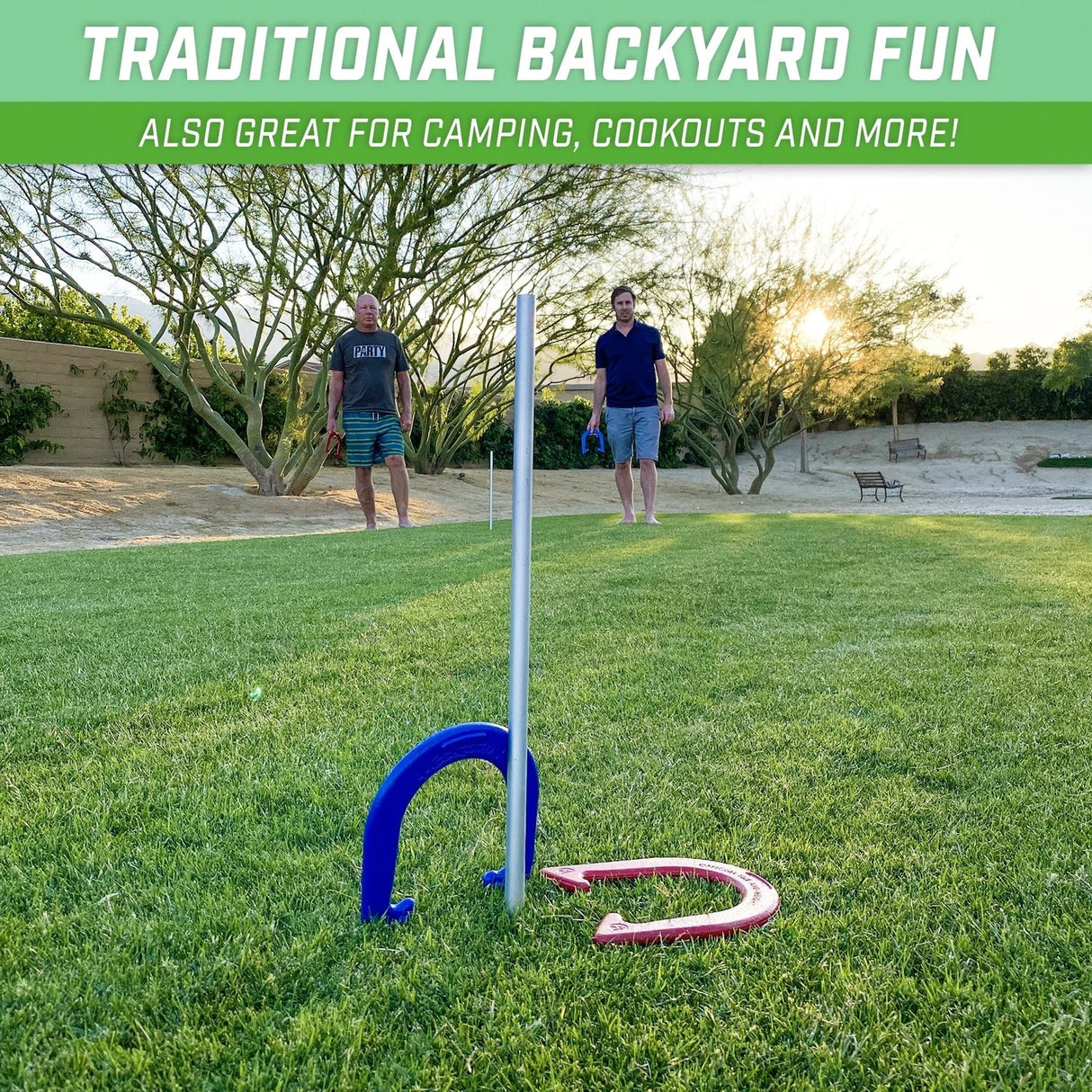 Traditional backyard fun. Also great for camping, cookouts and more! This is a lifestyle image showing one blue horseshoe and one red horseshoe next to one of the stakes. 