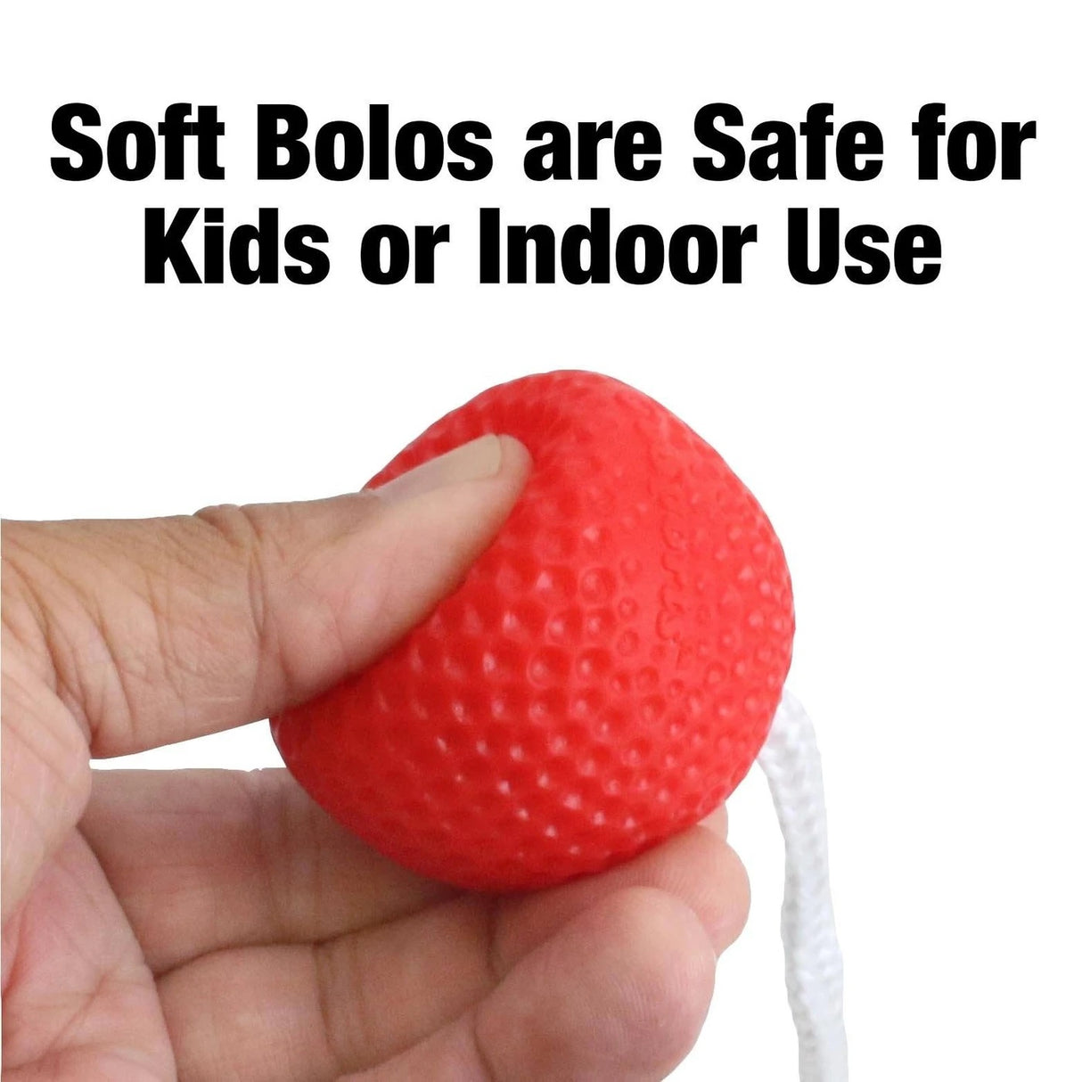 This image shows someone squishing the bolo ball to prove how soft and safe for kids they are.