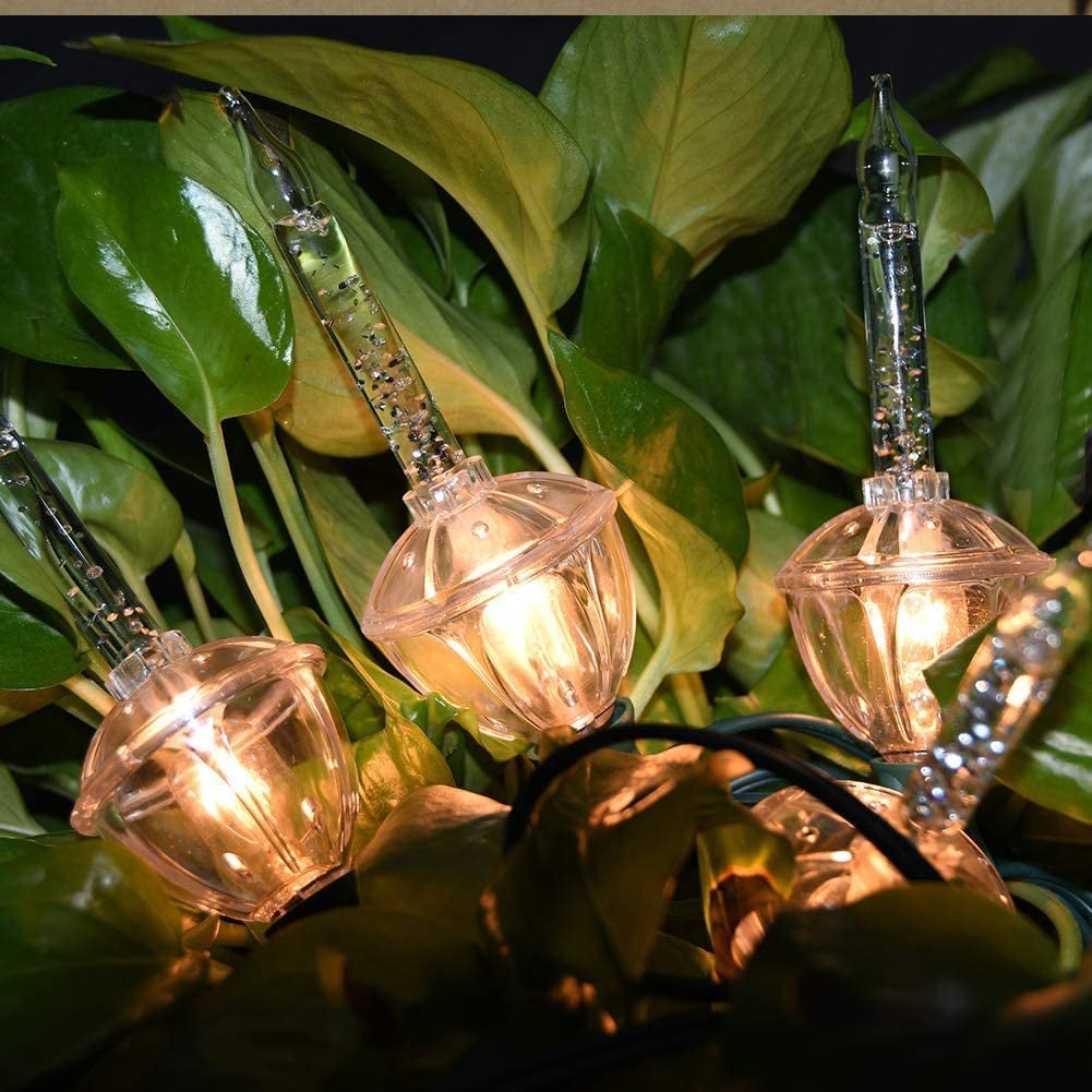 Clear and pure white bubble lights on a green wire.