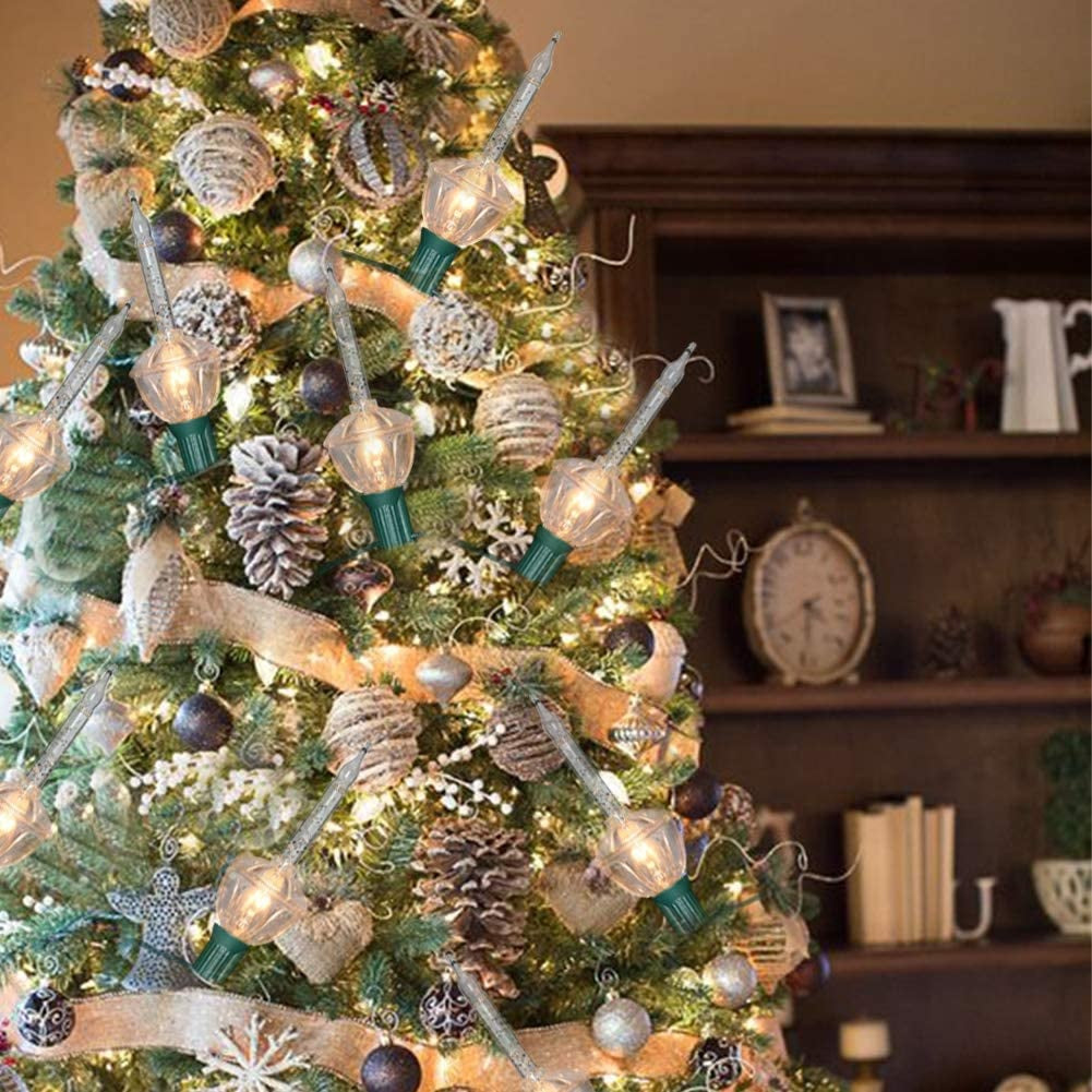 Clear and pure white bubble lights hanging from a decorated Christmas tree.