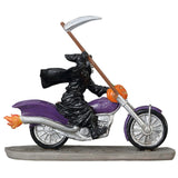 Polyresin figurine for a Lemax display. Designed to look like the Grim Reaper riding a purple motorcycle. There's a pumpkin on the front of the motorcycle. The Grim Reaper is holding a scythe.