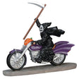 Polyresin figurine for a Lemax display. Designed to look like the Grim Reaper riding a purple motorcycle. There's a pumpkin on the front of the motorcycle. The Grim Reaper is holding a scythe.
