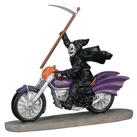 Polyresin figurine for a Lemax display. Designed to look like the Grim Reaper riding a purple motorcycle. There's a pumpkin on the front of the motorcycle. The Grim Reaper is holding a scythe.