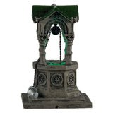 Plastic village accent for a Lemax display. Designed to look like an old, gothic well. The well is decorated with skulls, gargoyle heads and chains. There's a green light coming from inside.