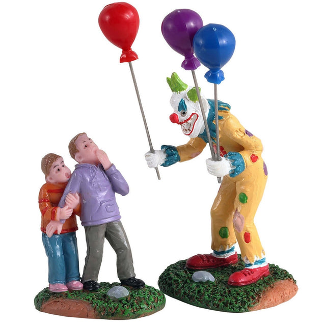 Polyresin figurines for a Lemax display. Designed to look like a scary clown trying to offer a balloon to two scared children.