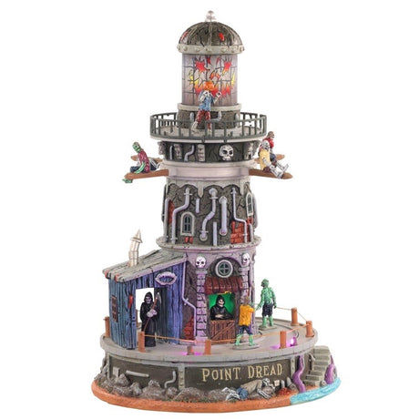 Polyresin building for a Lemax display. Designed to look like a spooky lighthouse. There are zombies and a grim reaper and people with pumpkin heads. There are skull accents and silver pipes. There are purple tentacles reaching up the steps from out of the water.