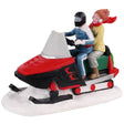 Polyresin figurine for a Lemax Village tabletop display. Designed to look like two people on a snowmobile