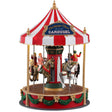 Polyresin figure for a Lemax display. Designed to look like a Christmas themed carousel. The top of the carousel is a red and white umbrella. The carousel features lots of gold and green accents There are kids on every horse on the carousel. The sign on the top reads "Christmas Cheer Carousel."