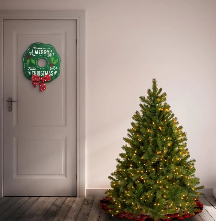 Artificial tree pre-lit with dual lights. Lights change from warm white to multi-colored.