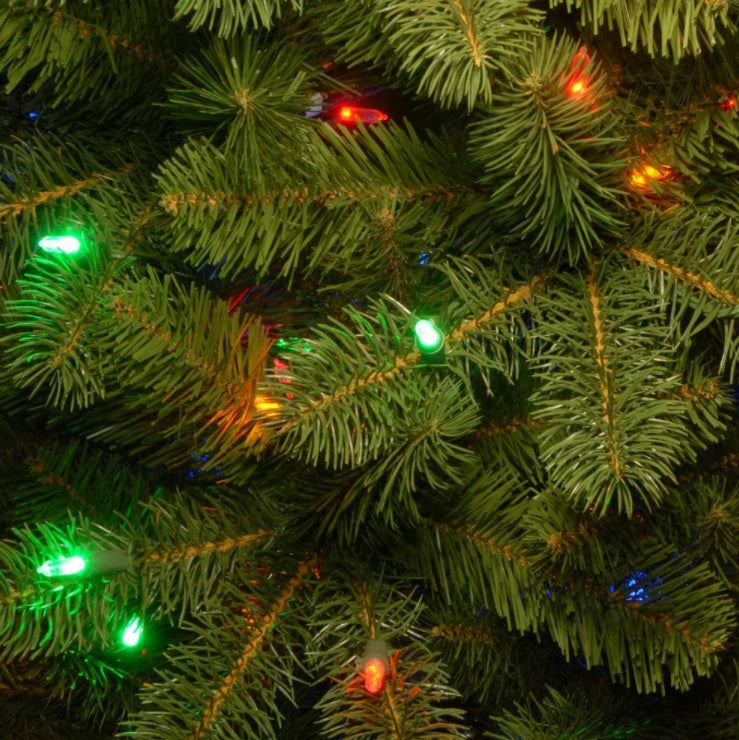 Artificial tree pre-lit with dual lights. Lights change from warm white to multi-colored.