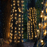 Tree trunk wrap lights. There are two color options: Multi-Colored or Warm White.