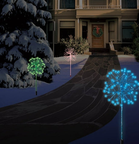 LED snowburst decorations. One is red, one is green and one is blue.