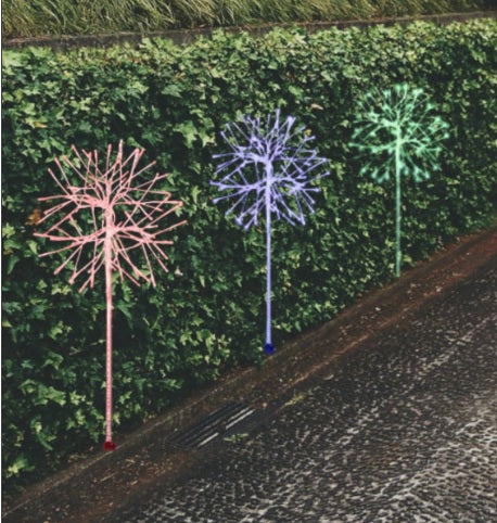 LED snowburst decorations. One is red, one is blue and one is green.