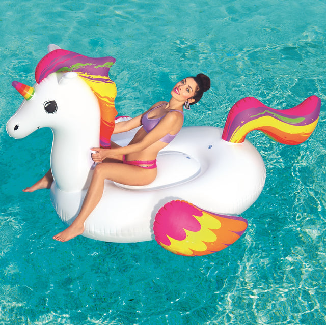 Inflatable pool float shaped like a white and rainbow unicorn.