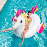 Inflatable pool float shaped like a white and rainbow unicorn.