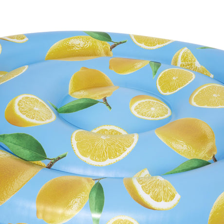 Light blue inflatable pool float with yellow lemons and green leaves on it. The float itself is lemon shaped AND lemon scented.
