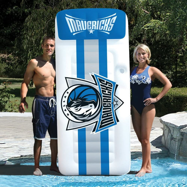Pool mattress with Dallas Mavericks logos on it.