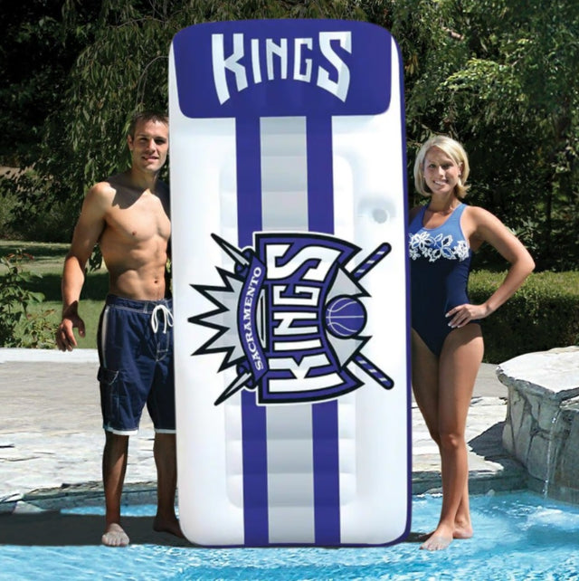Pool mattress with Sacramento Kings logos on it.