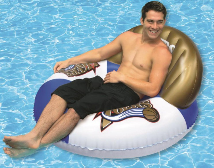 Pool lounge with the Philadelphia 76ers logos on it.