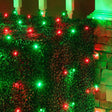 Basically a blanket of lights. You can wrap it around tree trunks, you can throw it over a bush, etc. There are different color options. These lights are red and green.