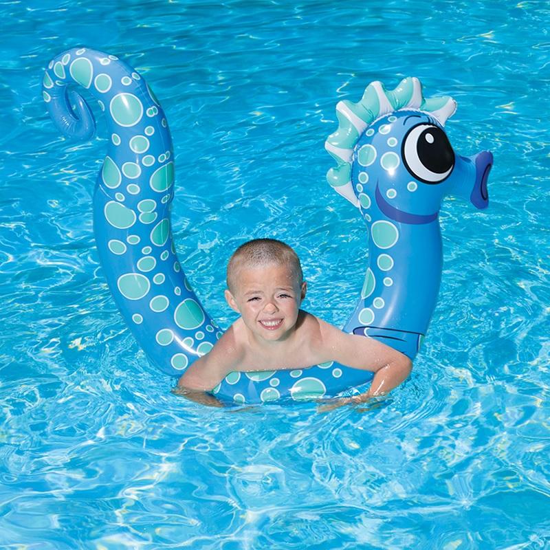 Pool inflatables shaped like seahorses. One is pink and one is blue.