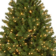 Artificial tree pre-lit with clear lights.