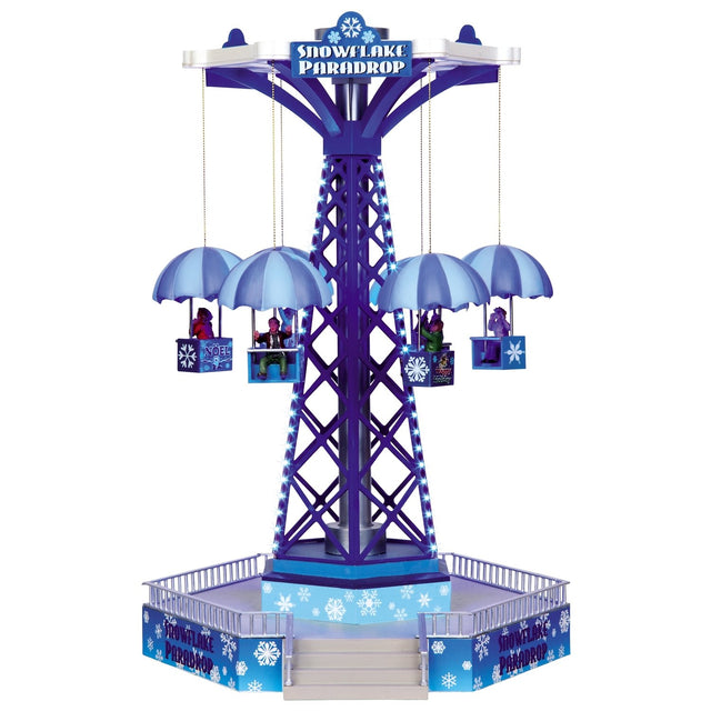 Village accent for a Lemax Carnival display. Designed to look like a snowflake themed carnival ride. The carts go in the air and fly around.