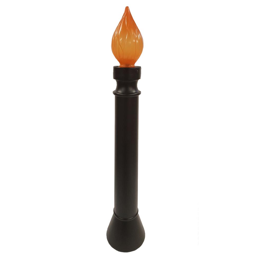Black blow mold candle with orange flame. Flame lights up.