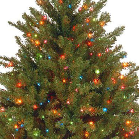 Artificial tree pre-lit with multi-colored lights.