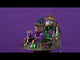 Resin carnival ride for a Lemax display. Designed to look like a bat cave. The ride's carts are shaped like purple bats.