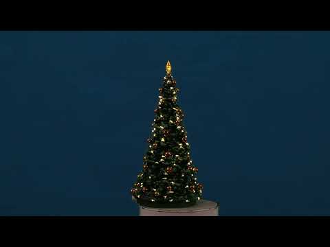 Resin village accessory for a Lemax display. Designed to look like a tall, decorated Christmas tree. There's a lit star on top, warm white lights and gold ornaments.