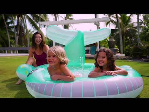 Inflatable pool for kids shaped like a cute, blue whale.